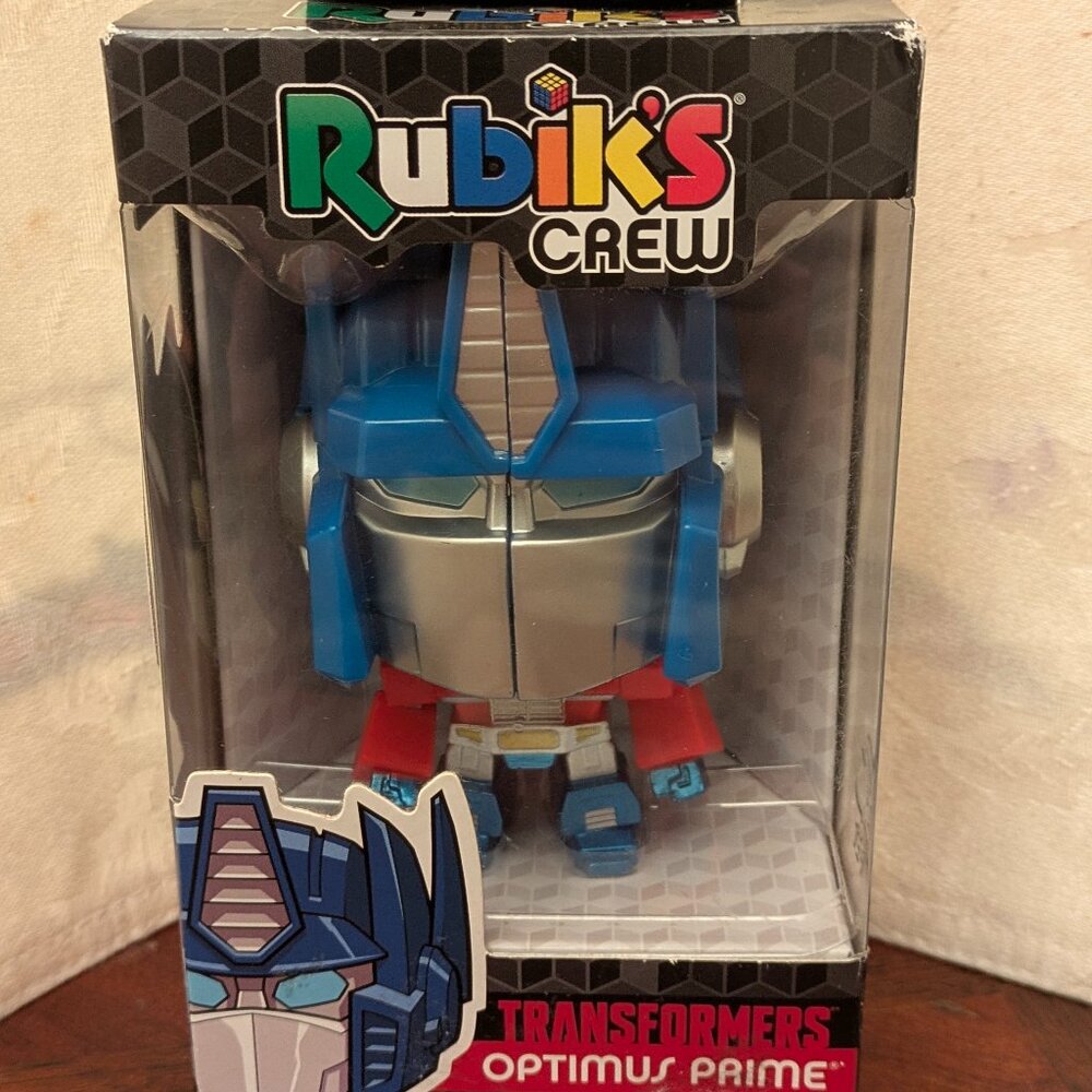 New in box Hasbro Rubik's Crew Optimus Prime Puzzlehead Collectible